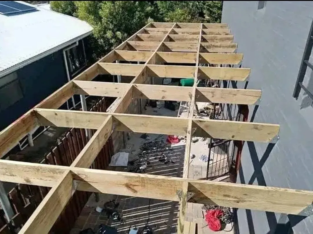 Timber pergola frame being built