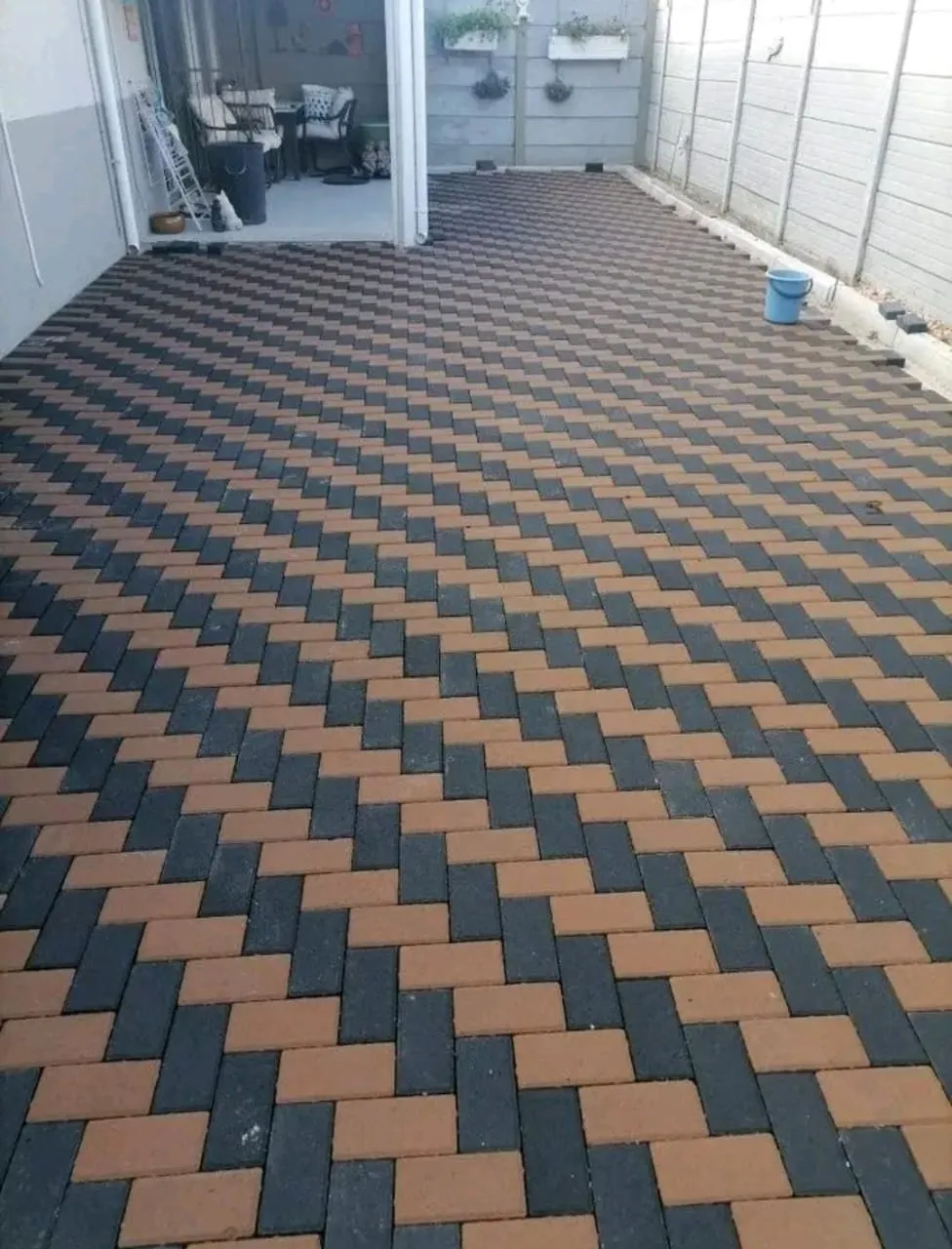Two-tone herringbone paved driveway