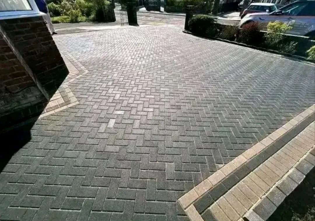 Charcoal herringbone driveway with grey border