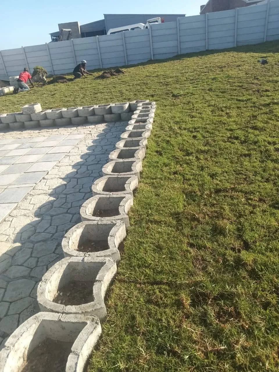 Lawn bordered by cast concrete edging